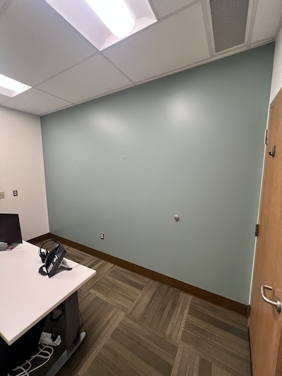 After repaint—Sunnyland office interior with fresh commercial paint, even coverage, and clean cut lines.