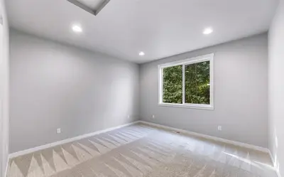 Cordata neighborhood bedroom repaint in Bellingham, WA — smooth walls and consistent finish coverage.