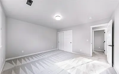 Second angle of a Cordata bedroom repaint in Bellingham, WA — straight cut-ins and a uniform interior finish.