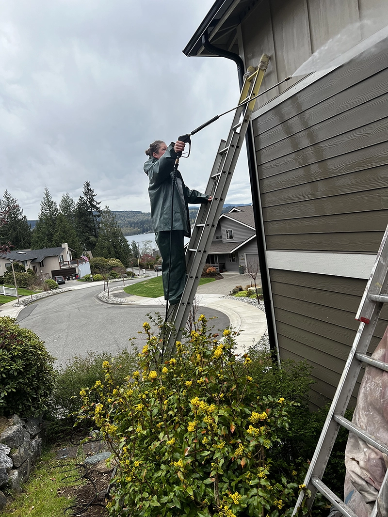 Power Washing a House